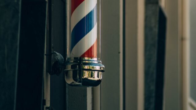 Traditional barber pole in Proença-a-Nova. Symbol of barbershop heritage.